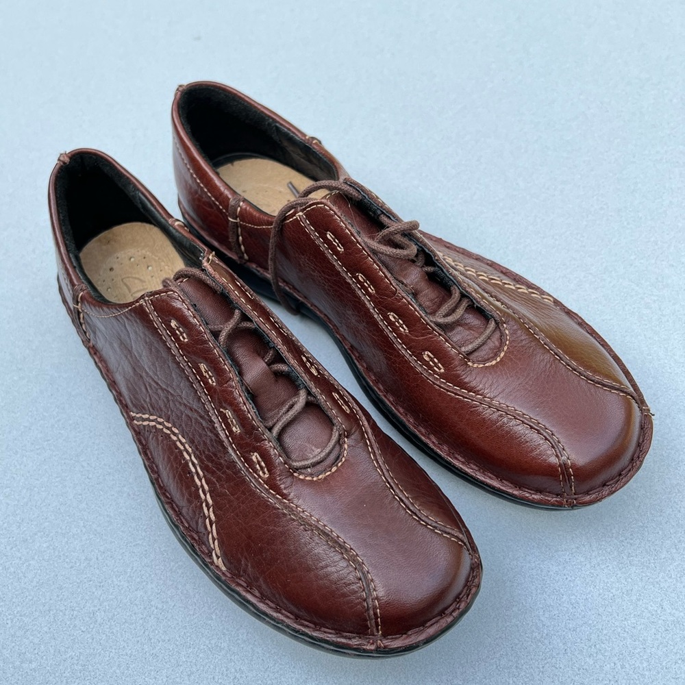 Shoes from Clarks of England in a size 6 1/2, brown, never worn.